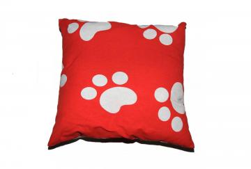 Coussin pattes rouges